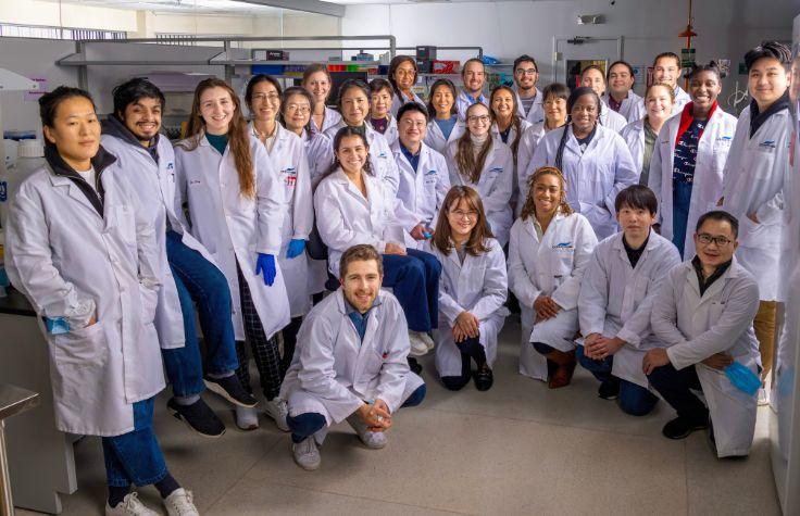 Lab members gather in Admera’s clinical service laboratory. 