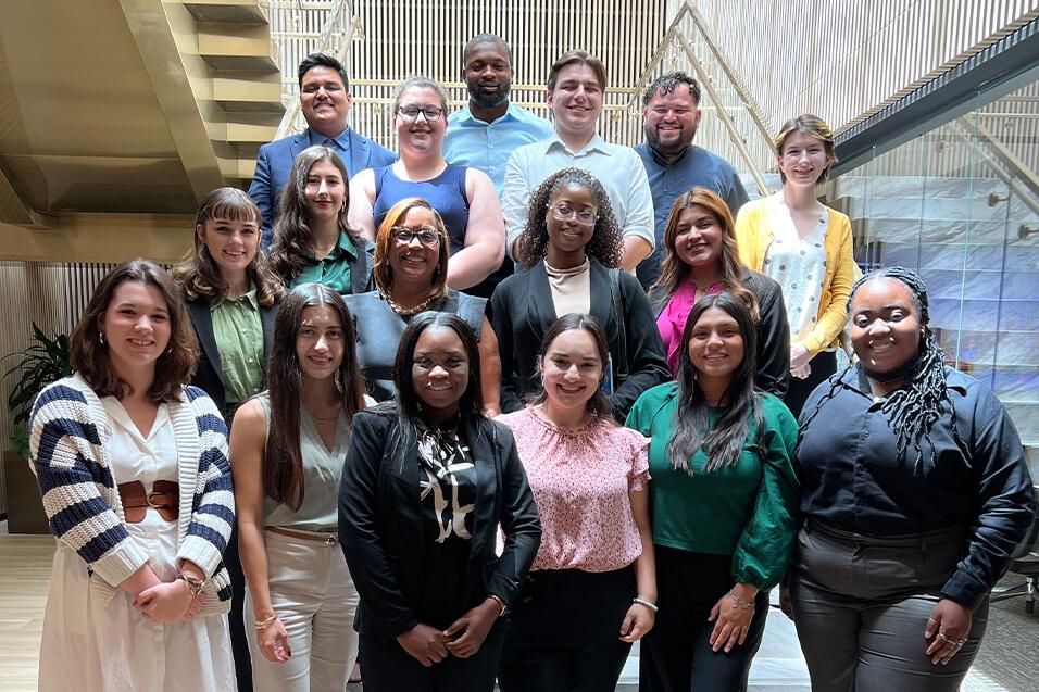 Group from the intern program, standing on stairs