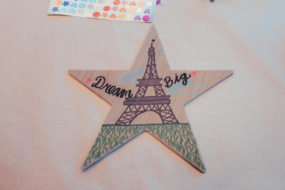 painted star reading "Dream Big"