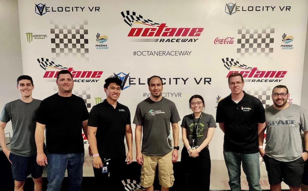 Christopher Reyes pictured with his team at an F1 race.