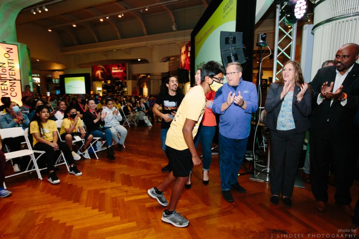 Ohio eighth grader Tarun Batchu accepts his award