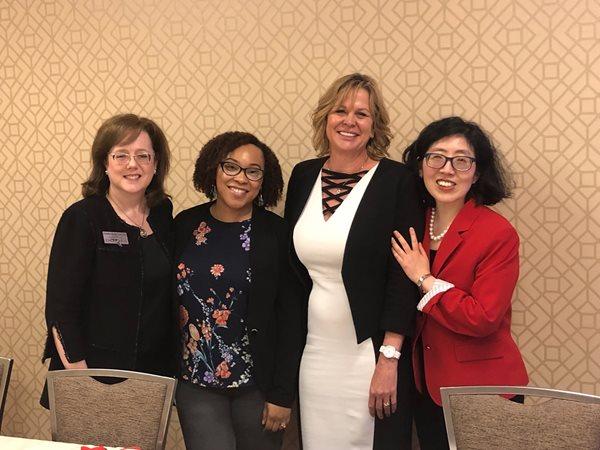 Koch deputy general counsel Jenny Kim (far right) moderated the discussion between Christina Melton Crain, founder and president/CEO of Unlocking DOORS; Teisha Sanders, project director at the Institute for Justice Research & Development at Florida State University’s College of Social Work; and Michelle Cirocco, chief social responsibility officer at Televerde.