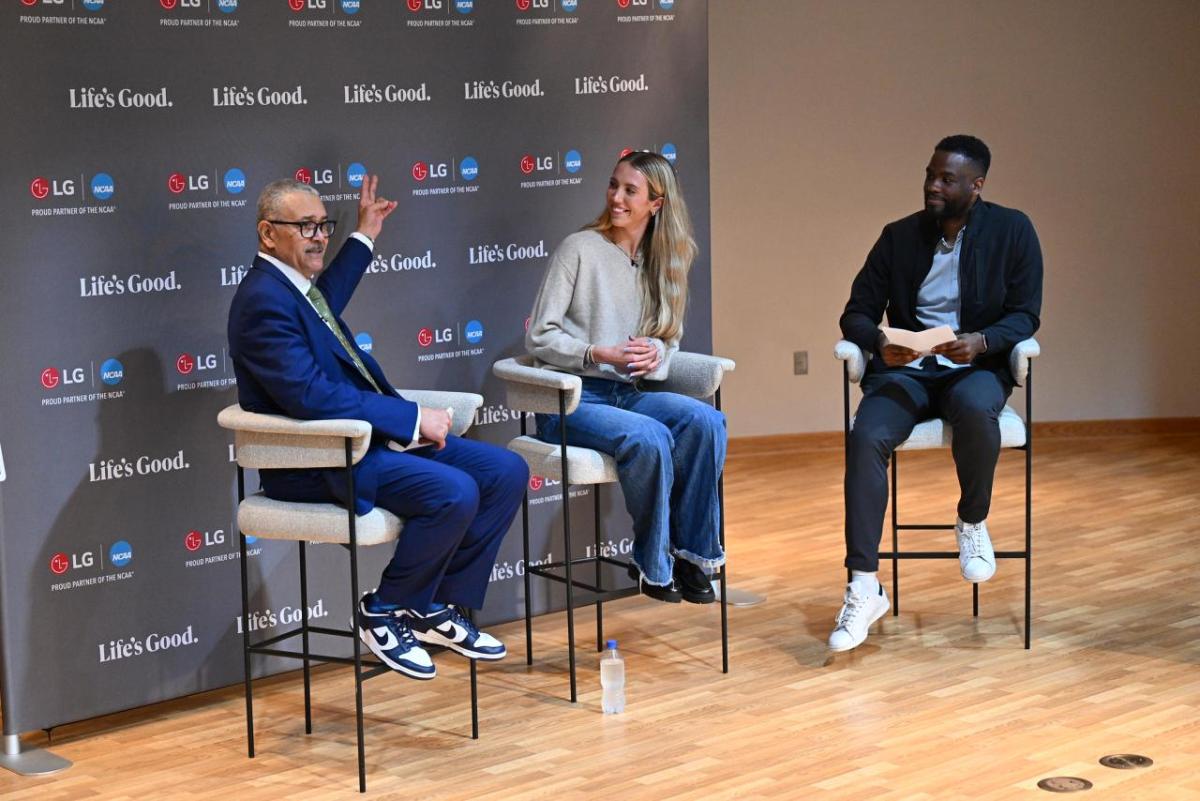 Johnny Milabu of LG Electronics, right, moderates a discussion about mental health with Daniel Gillison, CEO of the National Alliance on Mental Illness (NAMI), left, and WNBA player Lexie Hull Friday, April 3, 2026, in Indianapolis, Indiana.