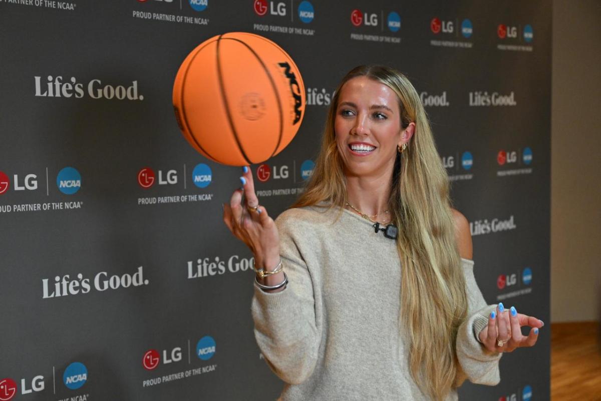 WNBA player Lexie Hull spins a basketball on her finger after participating in a discussion about maintaining good mental health held by LG Electronics North America and the National Alliance on Mental Illness (NAMI) on Friday, April 3, 2026, in Indianapolis, Indiana.