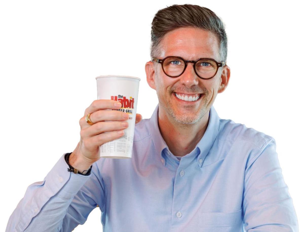 Jack Hinchliffe holding a cup