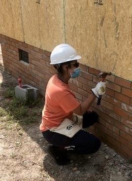 Jazenia working on the house.