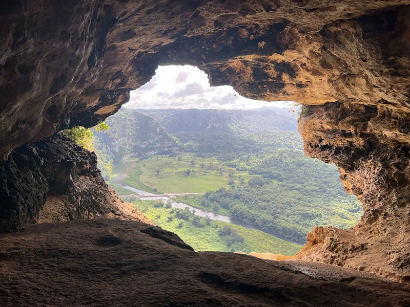 Entrance to a cave shown from the inside.