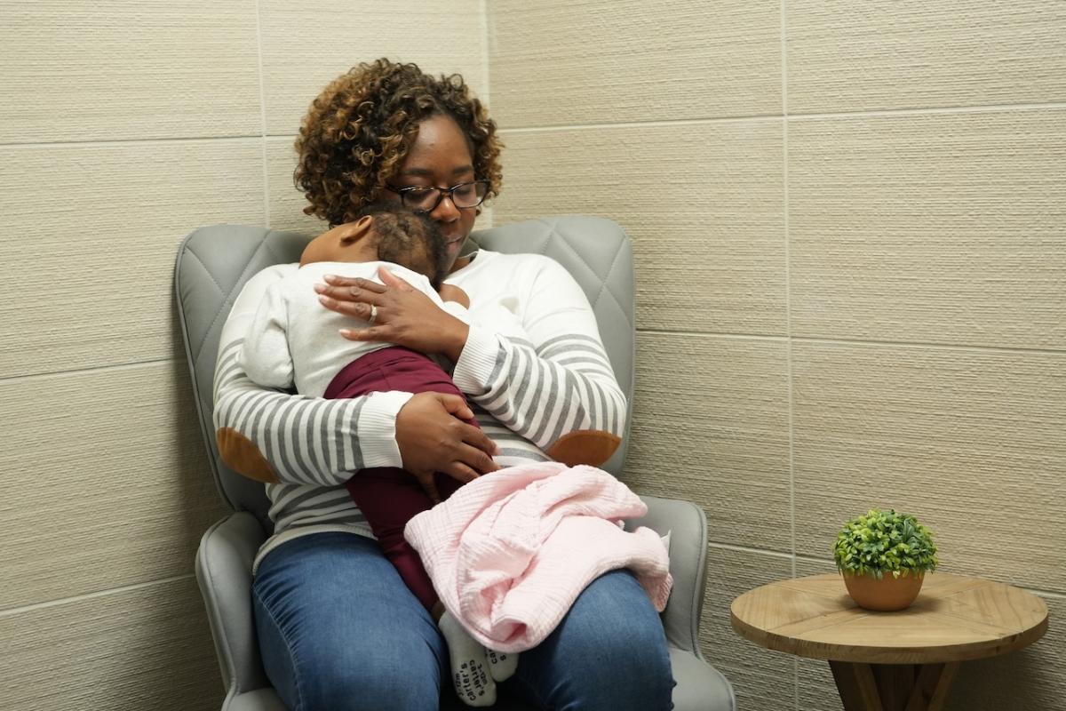 Joy Jackson and her daughter, Nyla, experience one of the new Aflac Mother’s Rooms at the South Carolina State Museum.