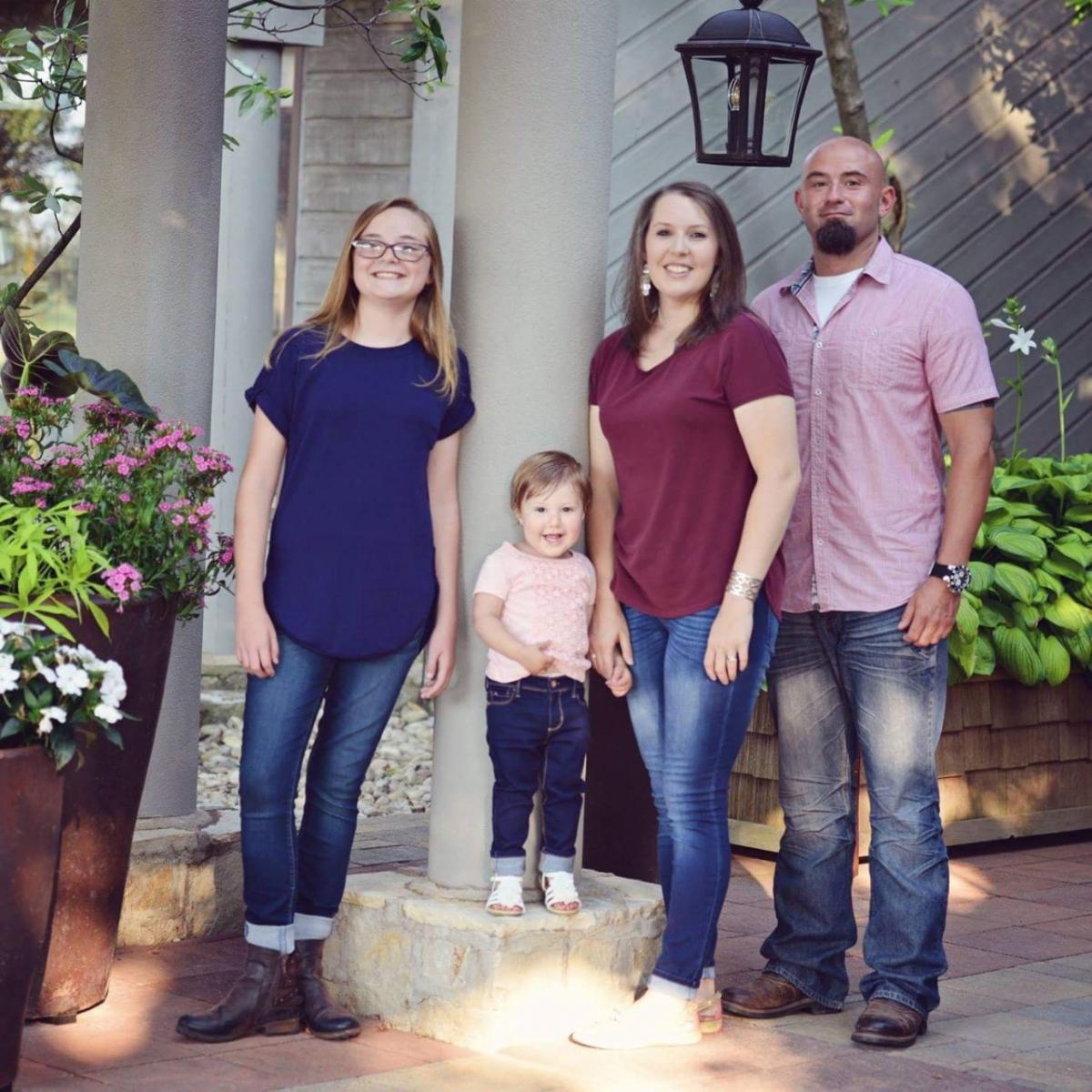ScottsMiracle-Gro associate Justin Farmer with his family