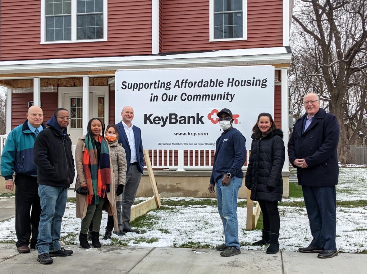 L to R: Kerry Quaglia - CEO, Home HeadQuarters, Kevin Schoon - Site Director, Opportunity Headquarters, Latoya Allen - Deputy Director, Home HeadQuarters, Celina DeFrancis - Executive Administrator to the CEO, Home HeadQuarters, Brian Petranchuk – KeyBank Commercial Relationship Manager, Carver Brown - Crew Member, Opportunity Headquarters, Sabrina Webster – KeyBank Central New York Commercial Sales Leader, Stephen Fournier – KeyBank Central New York Market President