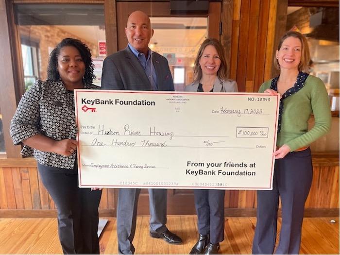 Photo caption:  KeyBank’s Market President John Manginelli (center left) and Corporate Responsibility Officer LaKisha Jordan (left) present a $100,000 grant to Hudson Rivers Housing’s Executive Director Christa Hines (center right), and Director of Strategic Initiatives Elizabeth Druback-Celaya in support of the organization’s Employment Assistance and Training Services (EATS) program.  Photo credit: KeyBank 