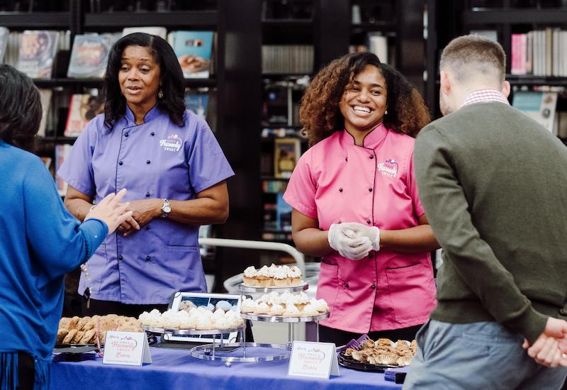 Jera  Stewart in her bakery with her team.