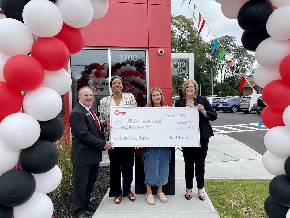 Check presentation to Bethesda House of Schenectady by KeyBank team.