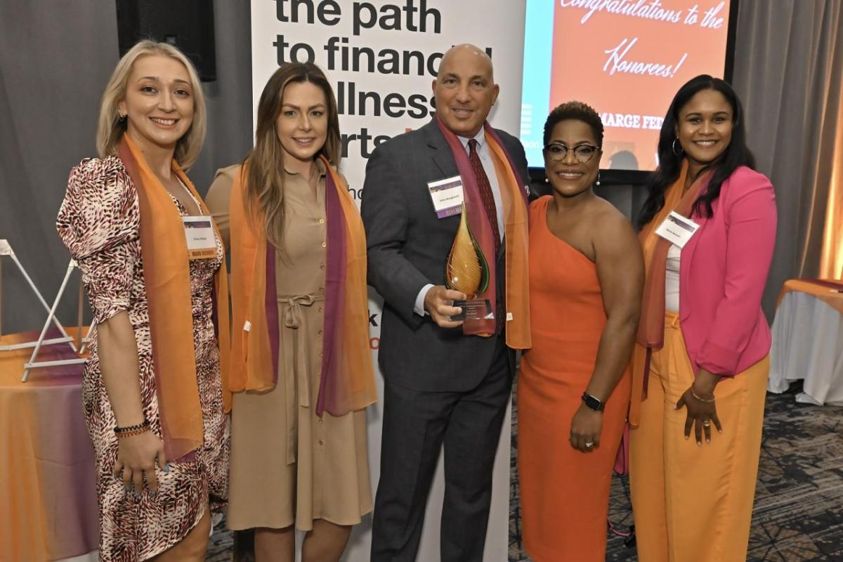  From left: Elona Shape, KeyBank Area Retail Leader and YWCA board member; Analisha Michanczyk, KeyBank Corporate Responsibility Officer; John Manginelli, KeyBank Market President for Hudson Valley/Metro NY; Tiffany S.W. Hamilton, CEO YWCA White Plains & Central Westchester; and Maria Bassallo, KeyBank Branch Manager, White Plains Branch. 