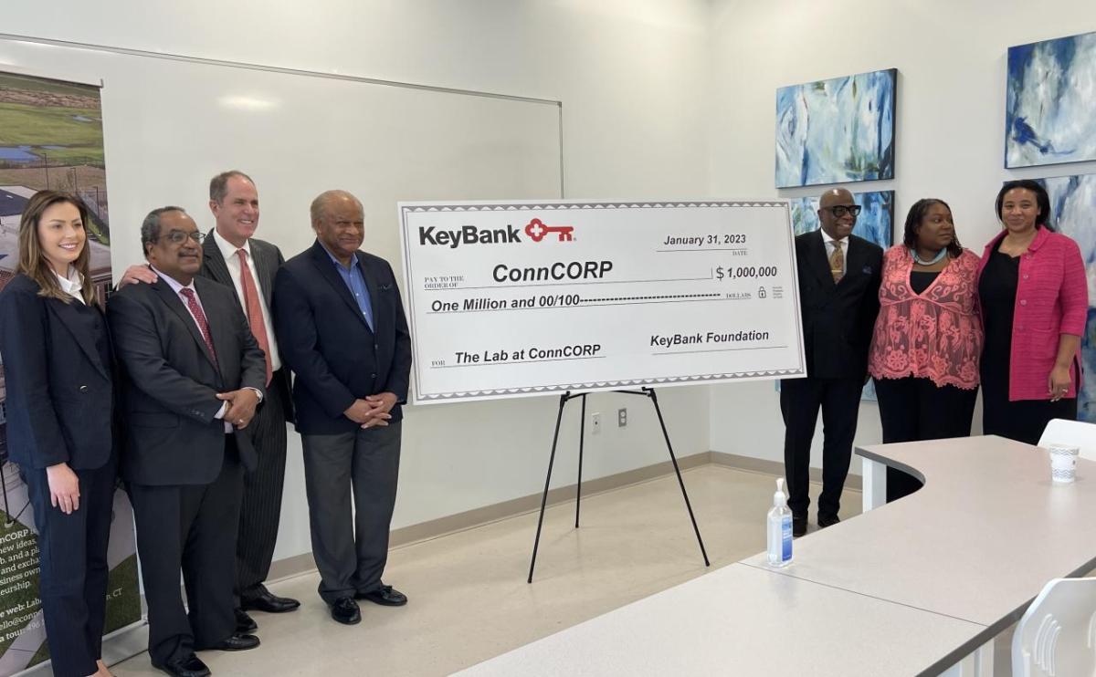 KeyBank and CONNCorp with Grant check.