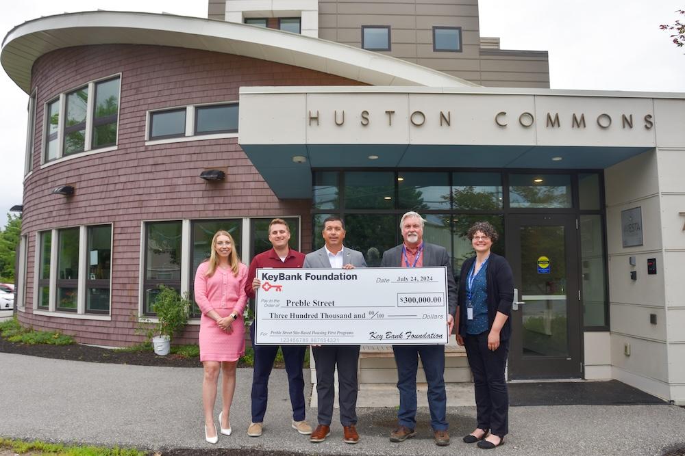 KeyBank leaders present grant to Preble Street. From left: KeyBank Area Retail Leader Meagan Calhoun, Branch Manager Lance Hutchins, KeyBank Maine Market President Tony DiSotto, Preble Street Executive Director, Mark Swann, Executive Director, and VP of Mission Advancement Ali Lovejoy. " '