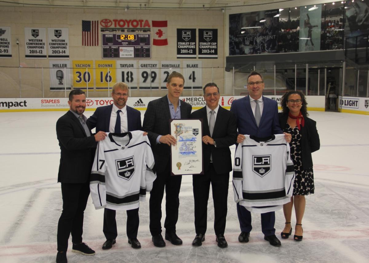 Los Angeles Kings President and Hockey Hall of Famer Luc Robitaille (left-center) and Councilmember Bob Blumenfield (right-center) celebrate the public-private partnership between the LA Kings and the City of Los Angeles to build and manage the Reseda Ice Rink, the City’s first ever year-round recreational ice facility.