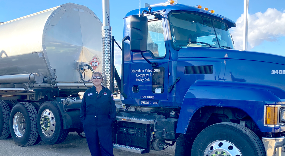 Shelly Kirk stood near a truck