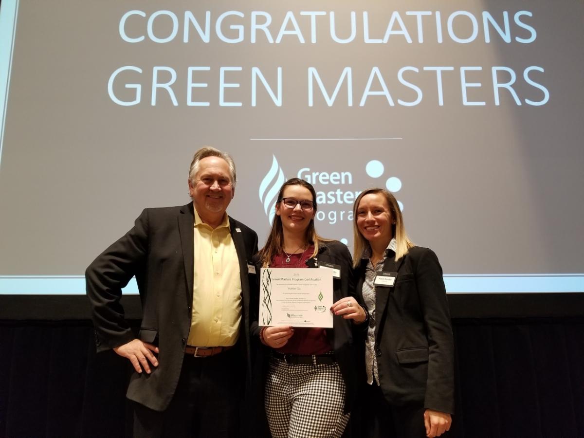 Nathan Nissen, Kelsey Holtz and Kayla Buszka of Kohler Co. accept the Green Masters recognition at the annual awards ceremony on December 12.