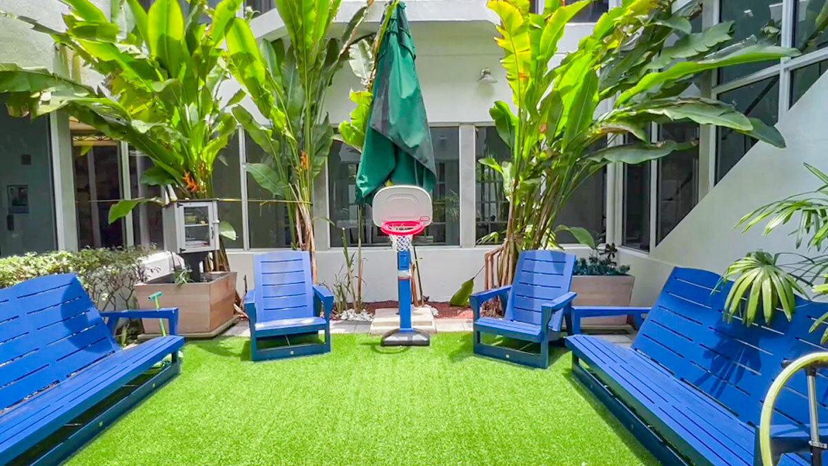 Blue lawn chairs in an outside area