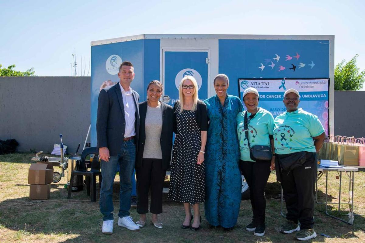 Dr. Matthew Smeltzer (Memphis University, Associate Professor, Division of Epidemiology, Biostatistics, and Environmental Health), Wendy Short Bartie (BMS Foundation Board Member and BMS Executive Vice President, Corporate Affairs), Catharine Grimes (BMS Foundation President), Christable Semondile (BMS Foundation Senior Program Officer), Dr. Bridgette Goeieman (Afia Tai Technical Director) and Sr. Sibongile Ramotshela (Afia Tai Founder and Managing Director) at a community cervical cancer screening event