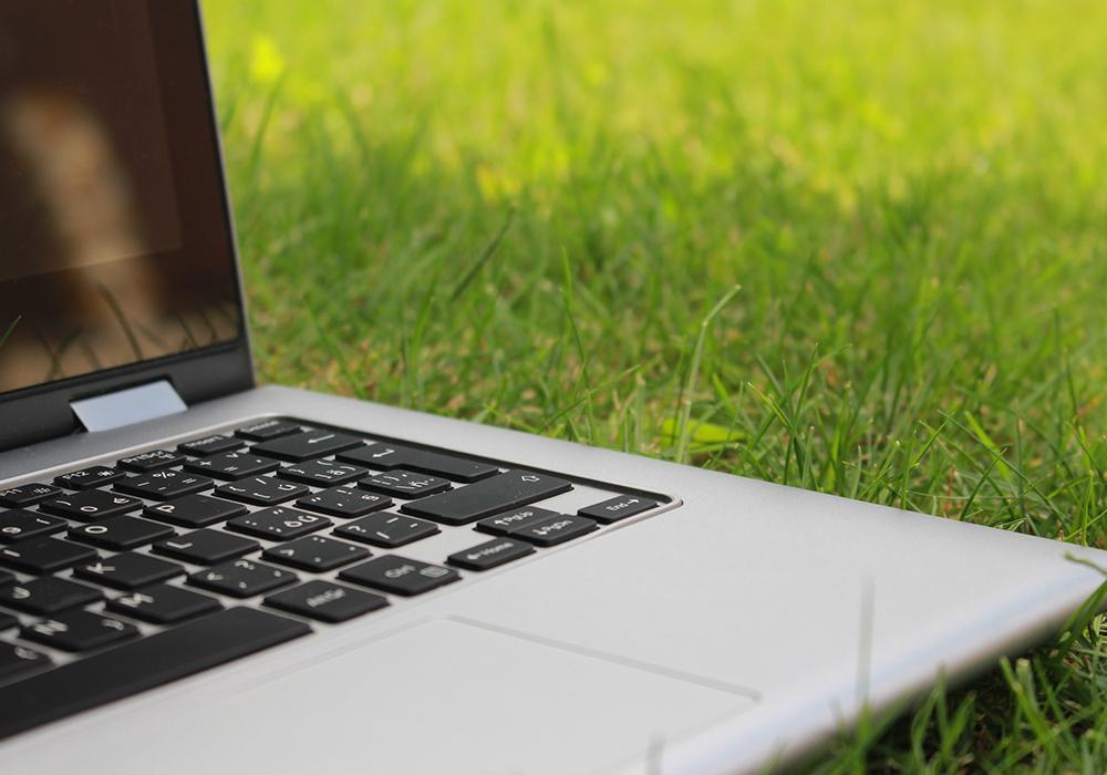 Sustainability Recruitment Laptop on Grass