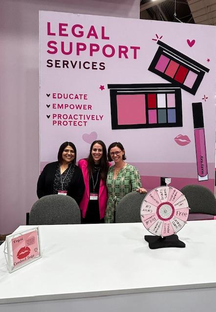 Three people smiling together 