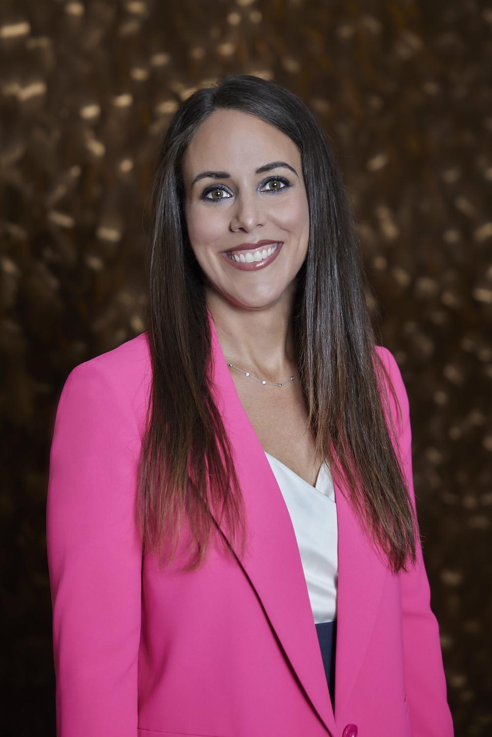 Naisha Covarrubias in pink jacket