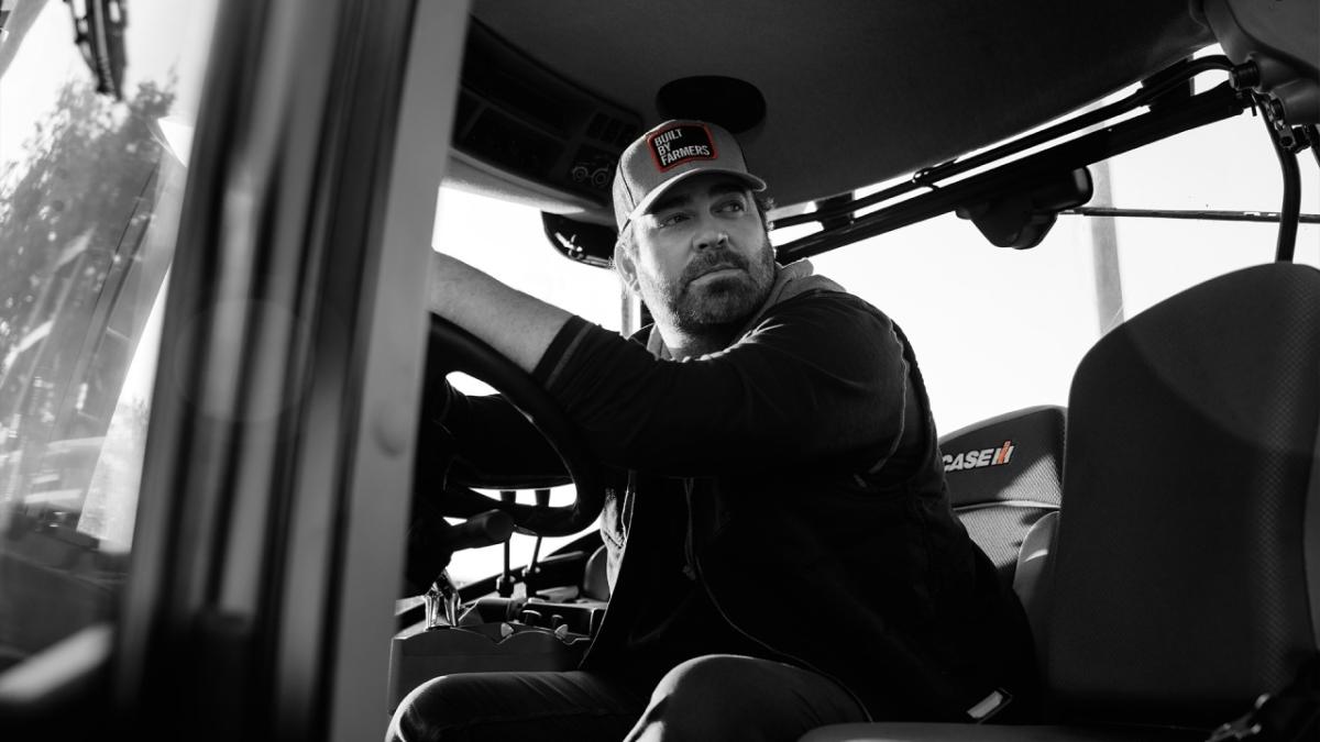 Country singer Lee Brice on a tractor