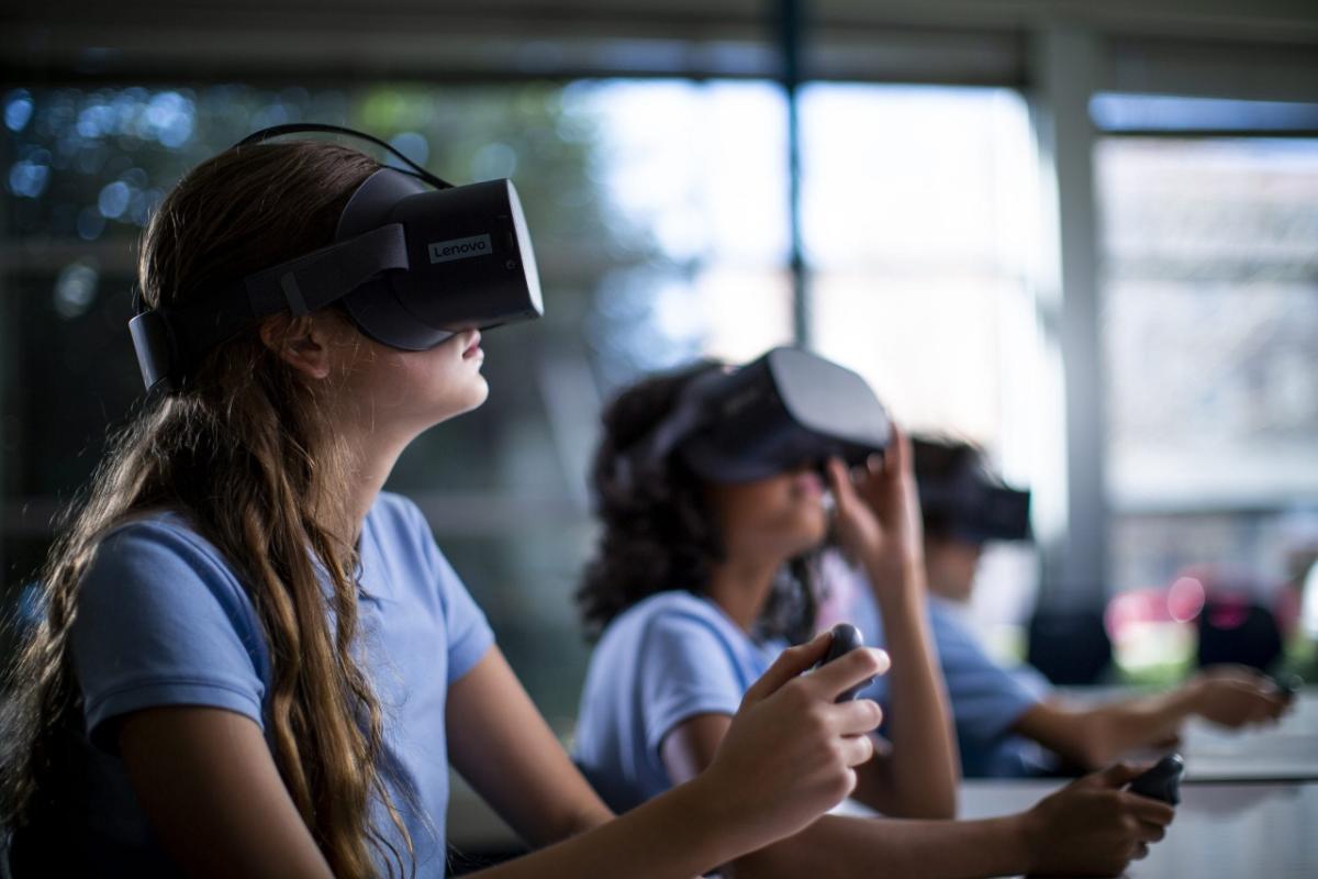 Kids in a classroom wearing VR headsets
