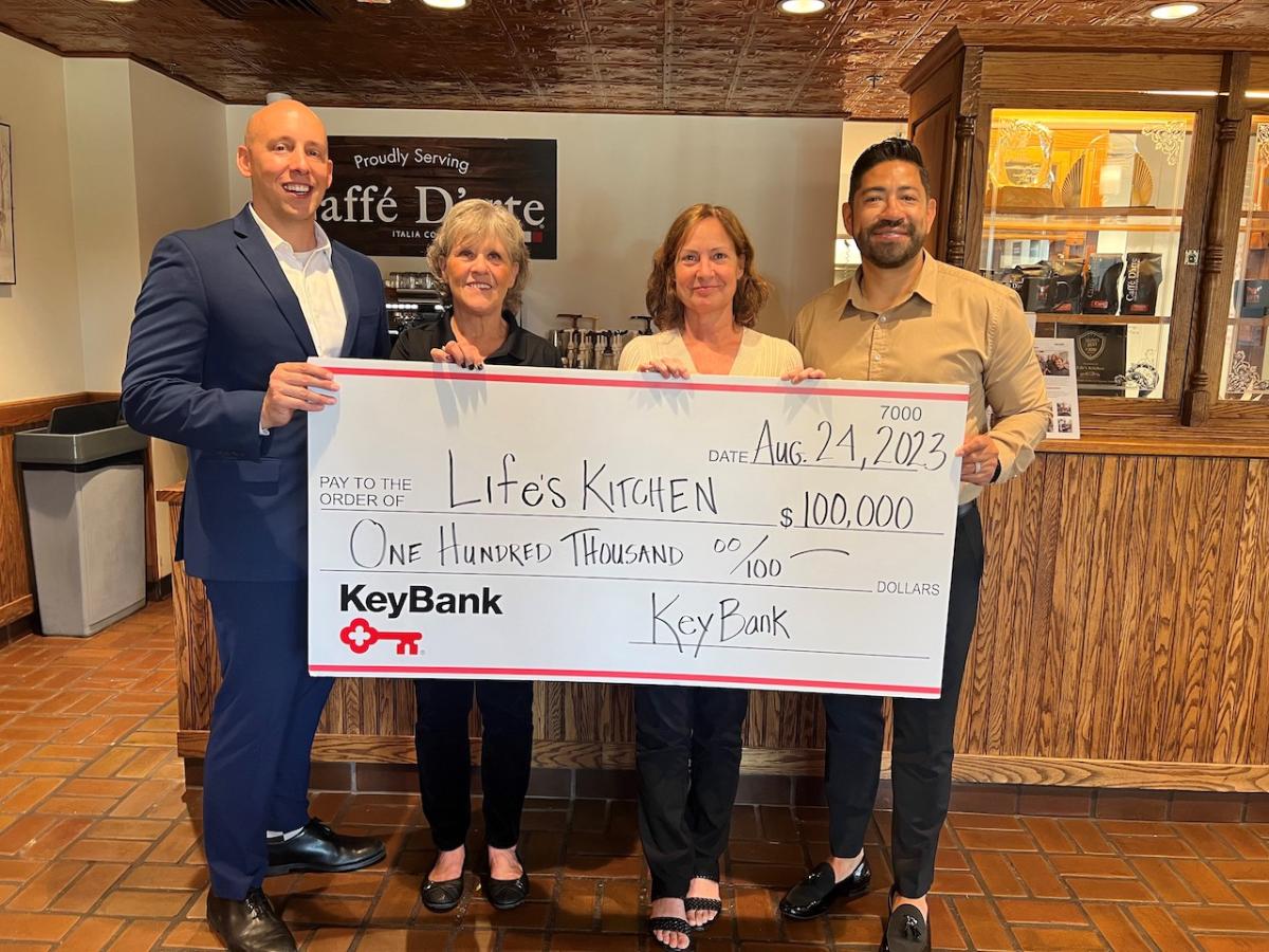 Life's Kitchen Team presented with a $100,000 check from  KeyBank