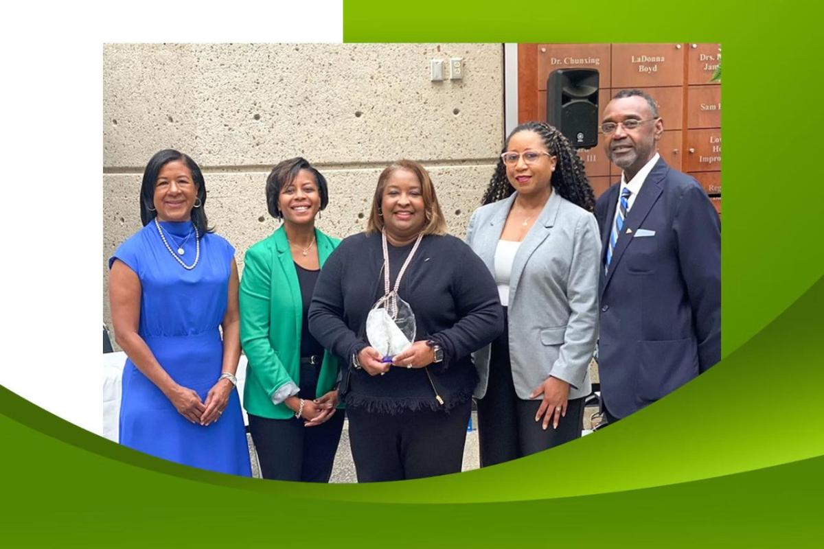 Latrisha Jemison (center) celebrates her Corporate Engagement Award from Tennessee State University with Regions colleagues Lethia Mann, Dana Williams, LaQuan Jackson and Dennie Marshall. " "