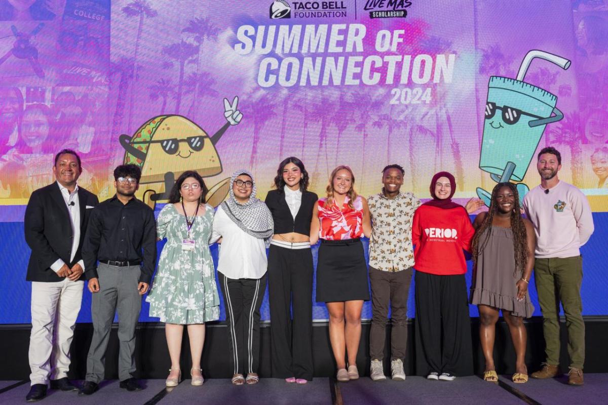 Group of Live Más Scholarship recipients on stage