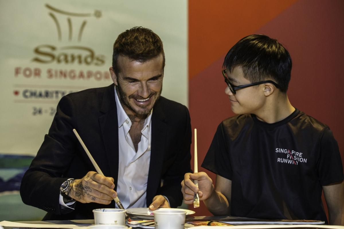 David Beckham with 15 year-old artist Leong Sijun