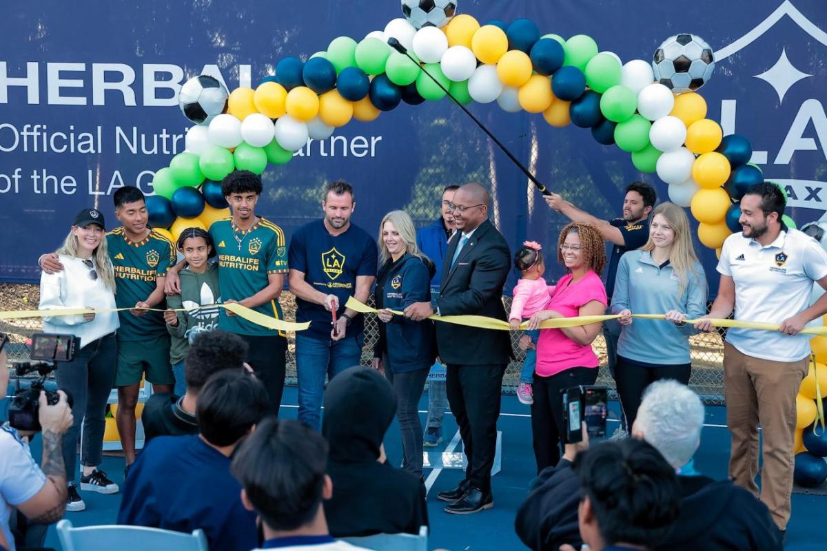 LA Galaxy's President Chris Klein and Galaxy players Jalen Neal and Daniel Aguirre join Long Beach Mayor Rex Richardson for the ribbon cutting ceremony.