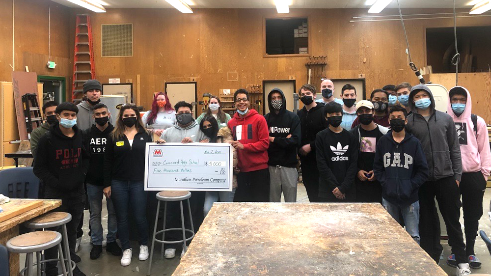 Students and teachers receiving $5,000 check