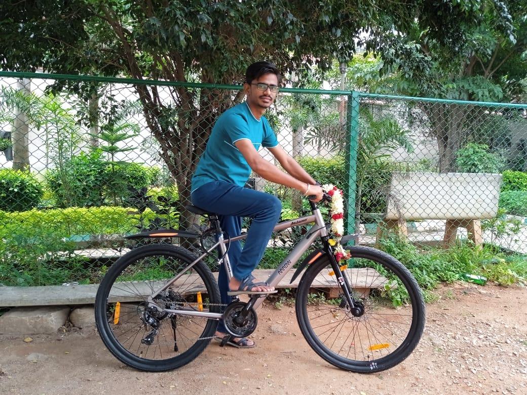 Mallikarjun Kanoj on a bicycle