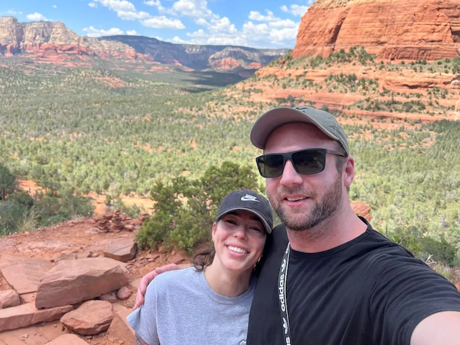 Mandy and her friend on a hike.