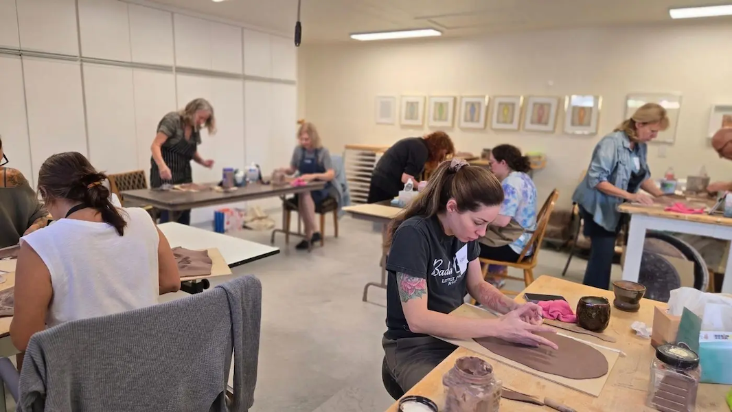 Mandy working on a pottery project.