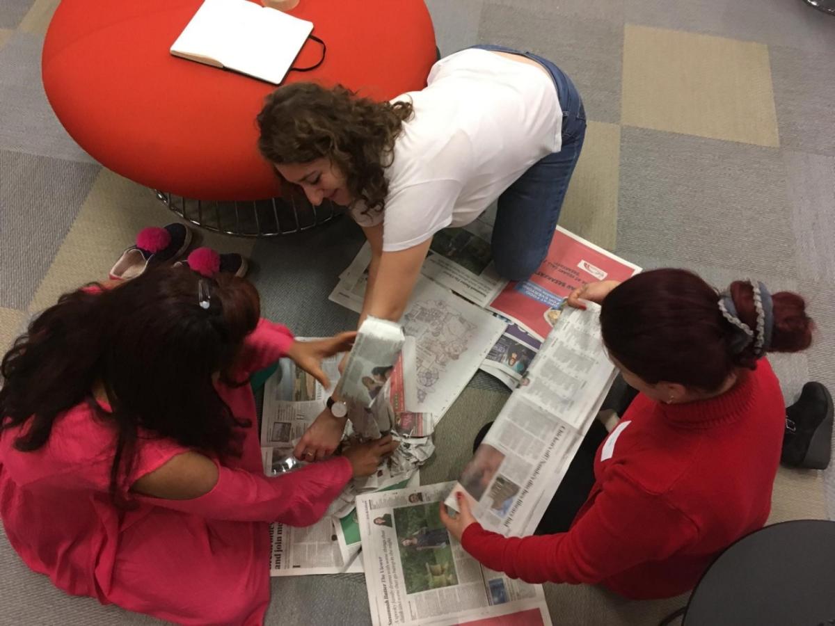 Blackbaud employee Mema Nackasha participates in an icebreaker exercise as a facilitator with The Sophie Hayes Foundation. Small teams work together to construct the tallest tower and then share the strengths they see in each other to help build trust and friendship.