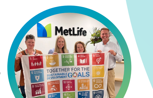 Colleagues in the United Kingdom show their support for the SDGs. "."