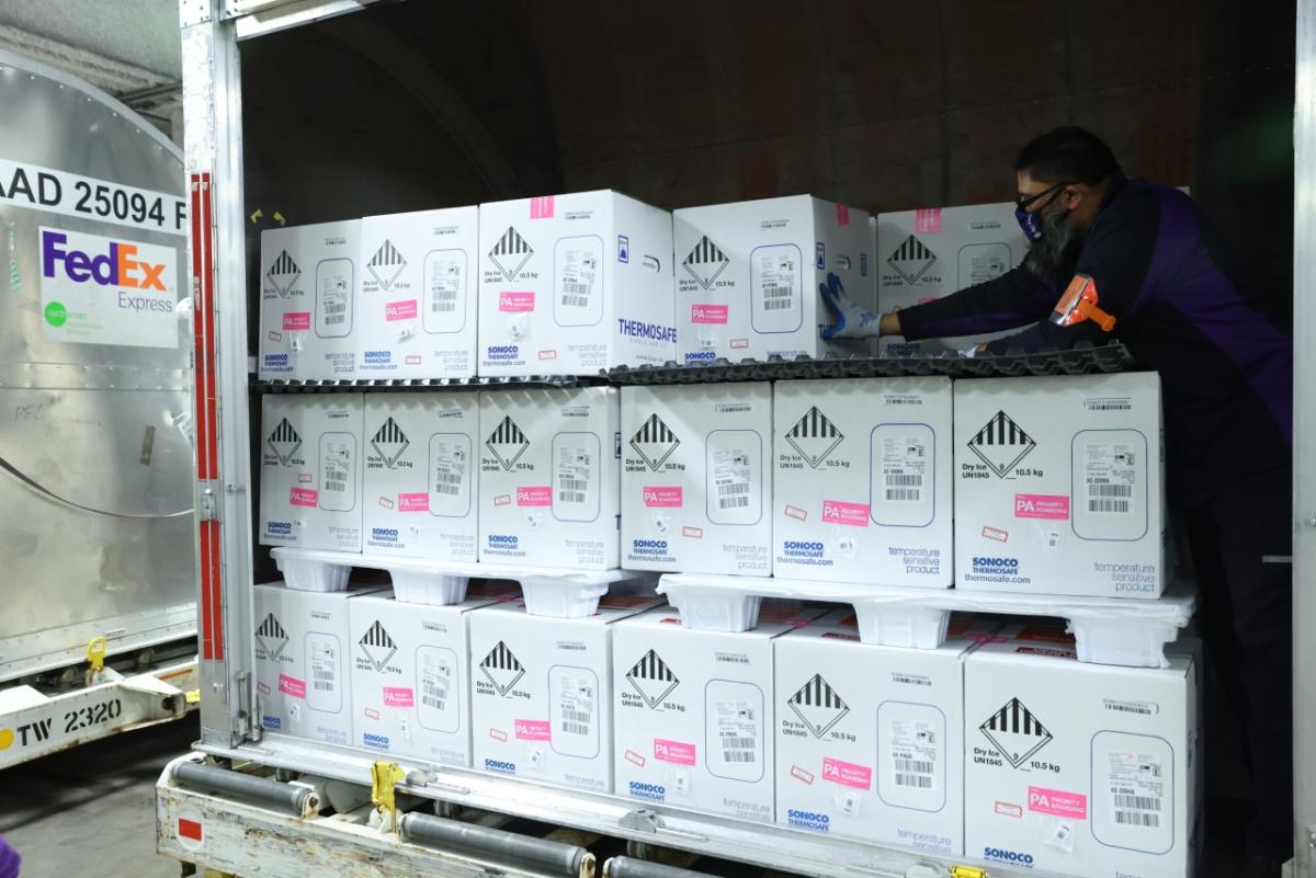 FedEx truck filled with boxes of vaccines