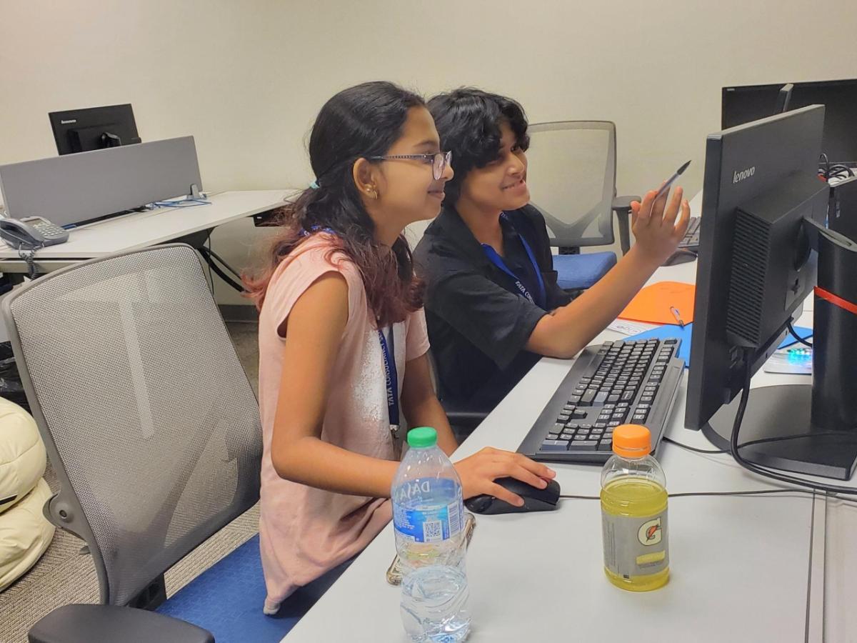 two students on a computer 