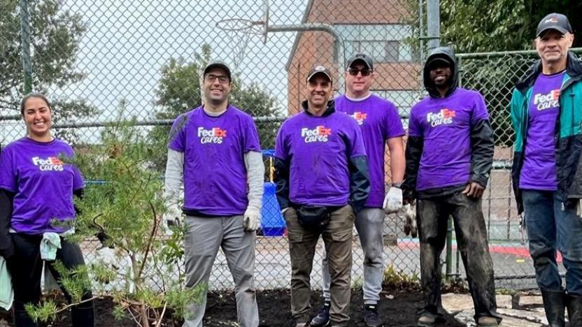  FedEx Montreal team wearing matching t-shirts 