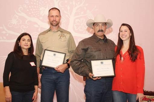 Freeport-McMoRan’s Martha Lujan, Manager of Environmental Services, left, and Leah Sunna, Environmental Scientist, right, recognized the assistance of Arizona Game and Fish in the program to relocate big horn sheep.