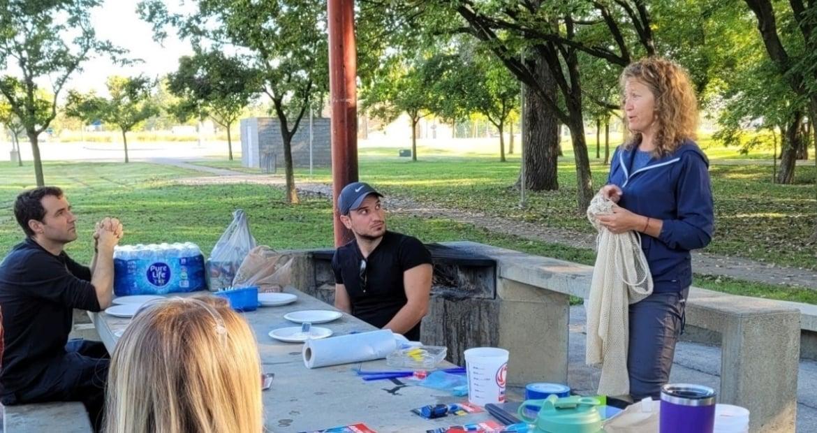 A leader from The Nature Conservancy instructs Cummins employees on the mussel tagging project.