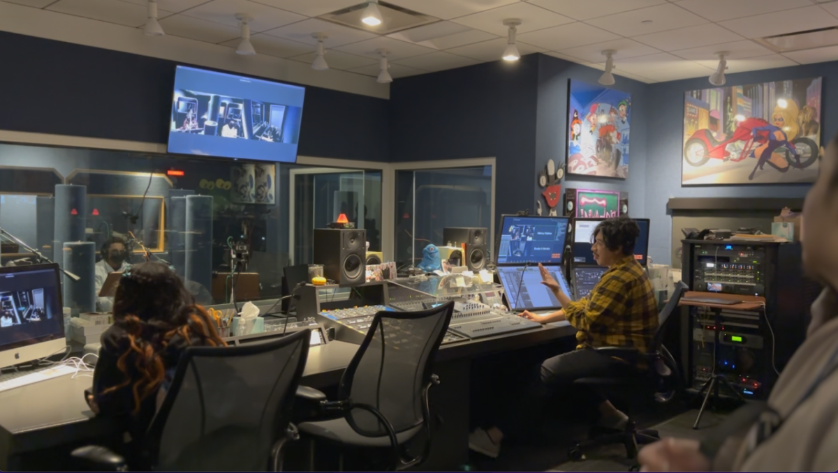 Young animators at work in front of the computer screens