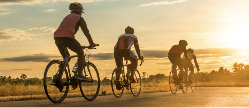 Bikers Riding into a sunset.