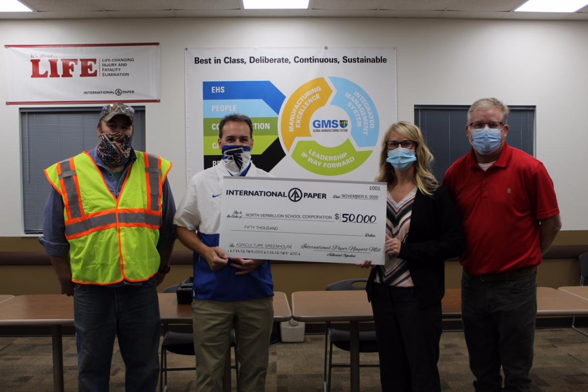 Jason McLain, Newport Mill Union President; Dan Nelson, North Vermillion School Corporation Superintendent; Lacy Romig, Agriculture Teacher; Mike Closson, Newport Mill Manager, International Paper
