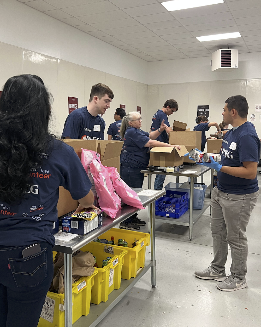 volunteers unpacking boxes
